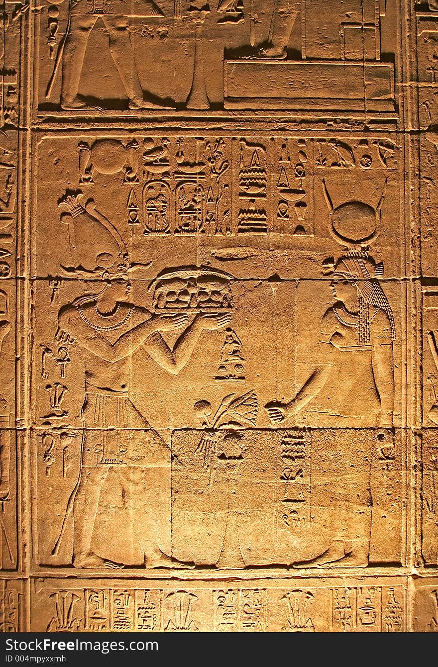 Hieroglyphics on the wall in the Temple of Philae at Aswan, Egypt (Low light photography)