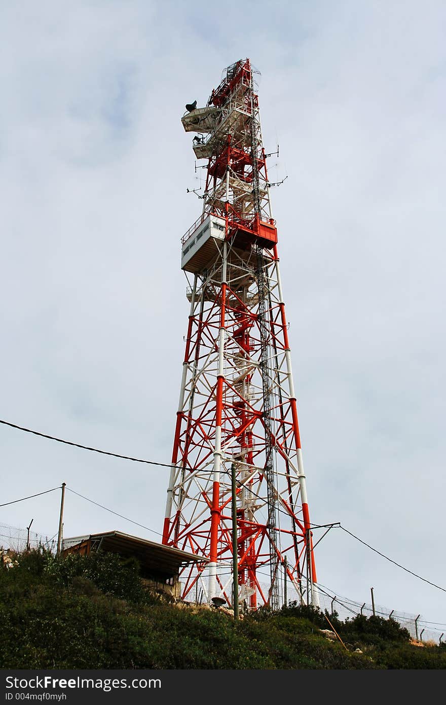 Telecommunications tower in a mountainous area. Telecommunications tower in a mountainous area