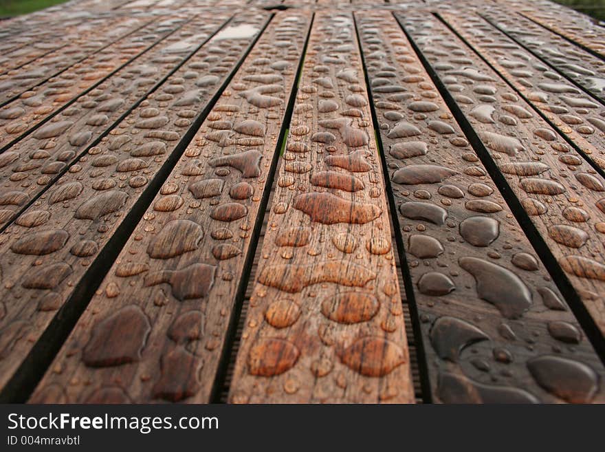 Waterdrops on wooden table