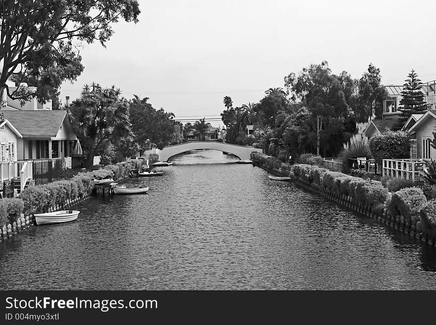 Canel in Venice, California with walkway bridge. Canel in Venice, California with walkway bridge