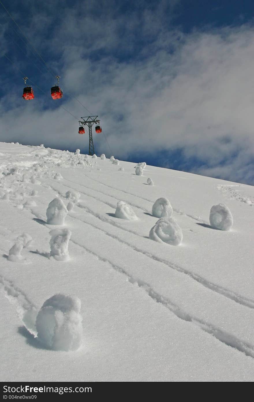 Snow snails created with snow shoes during winter holidays in the Swiss Alps. Snow snails created with snow shoes during winter holidays in the Swiss Alps