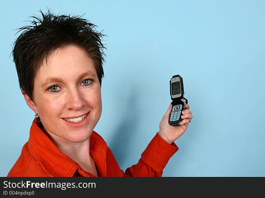 Young woman talking on her cellphone. Young woman talking on her cellphone