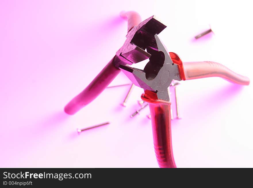 Two pliers together on white background. Two pliers together on white background