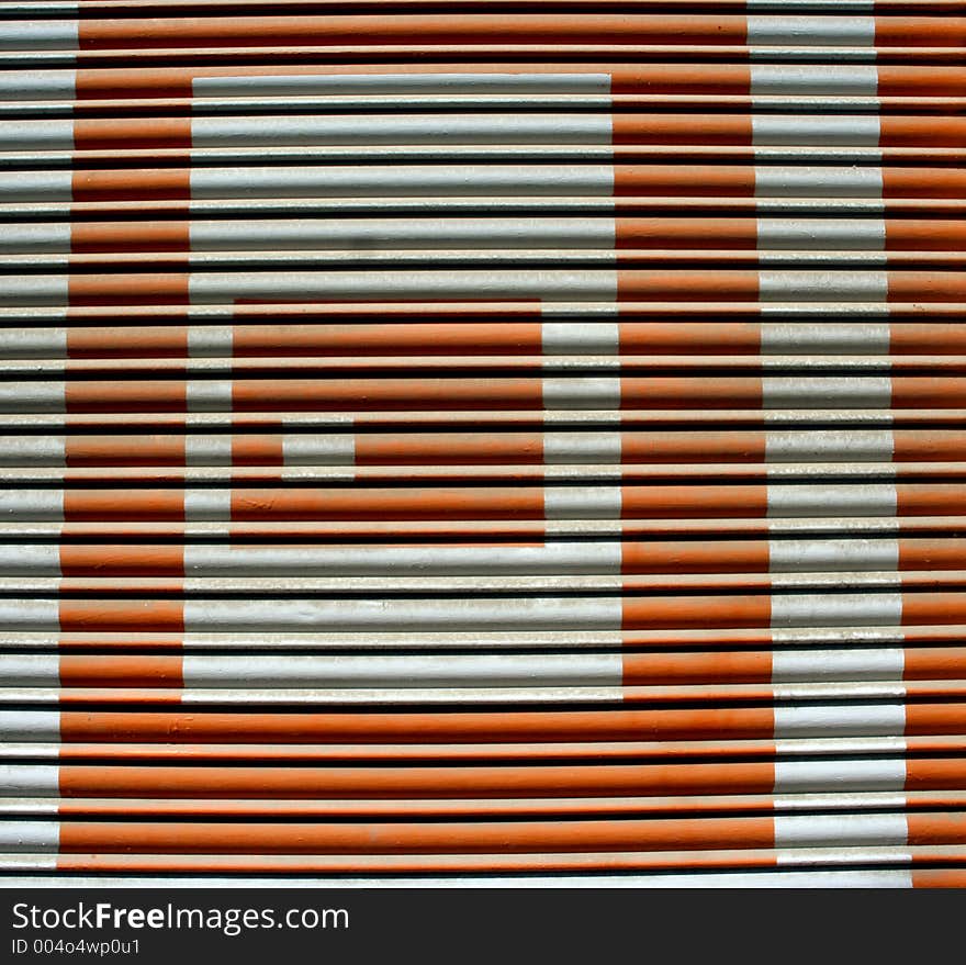 Hypnotic pattern on a shop shutter. Hypnotic pattern on a shop shutter