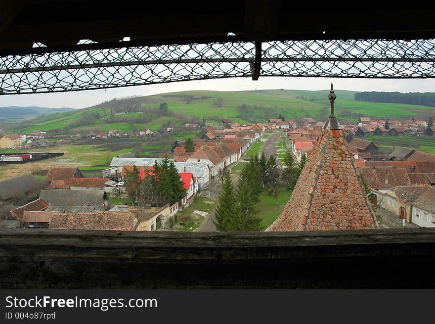 Panorama of Homorod village, taken from an old medieval tower. Fortified churces and peasant citadels are famous within these area of Romania. Built in the middle ages by German colonists. Unmanipulated shot. Panorama of Homorod village, taken from an old medieval tower. Fortified churces and peasant citadels are famous within these area of Romania. Built in the middle ages by German colonists. Unmanipulated shot.