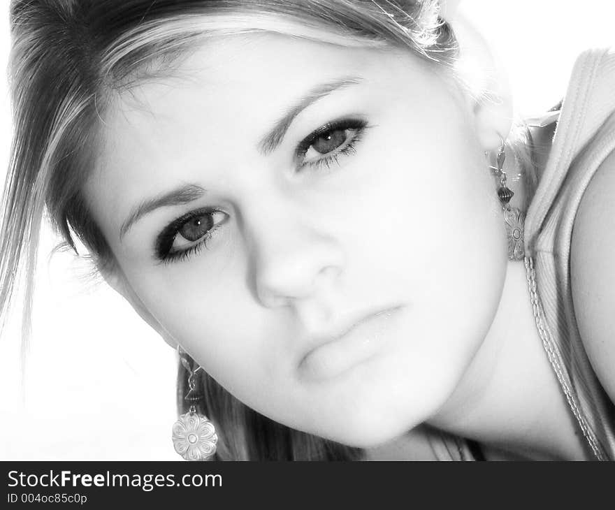 Beautiful teen girl outside close up in black and white. Beautiful teen girl outside close up in black and white.