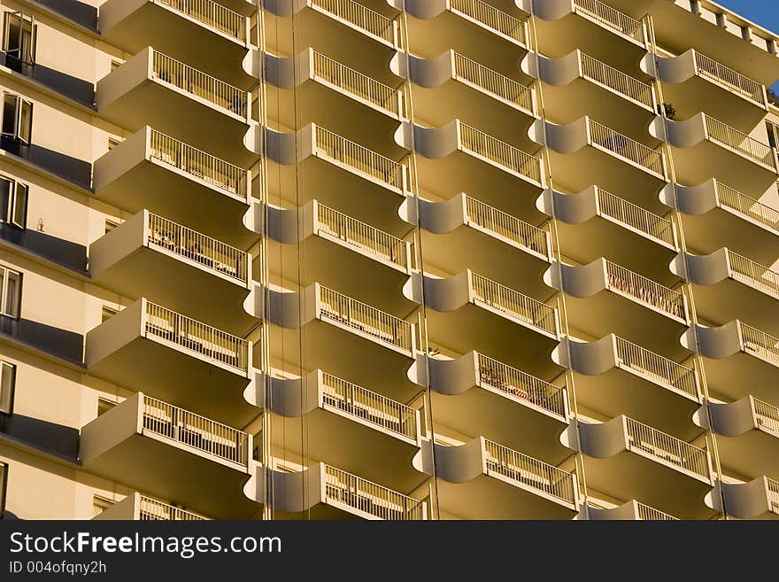 Urban balconies lit by the morning sun. Urban balconies lit by the morning sun.