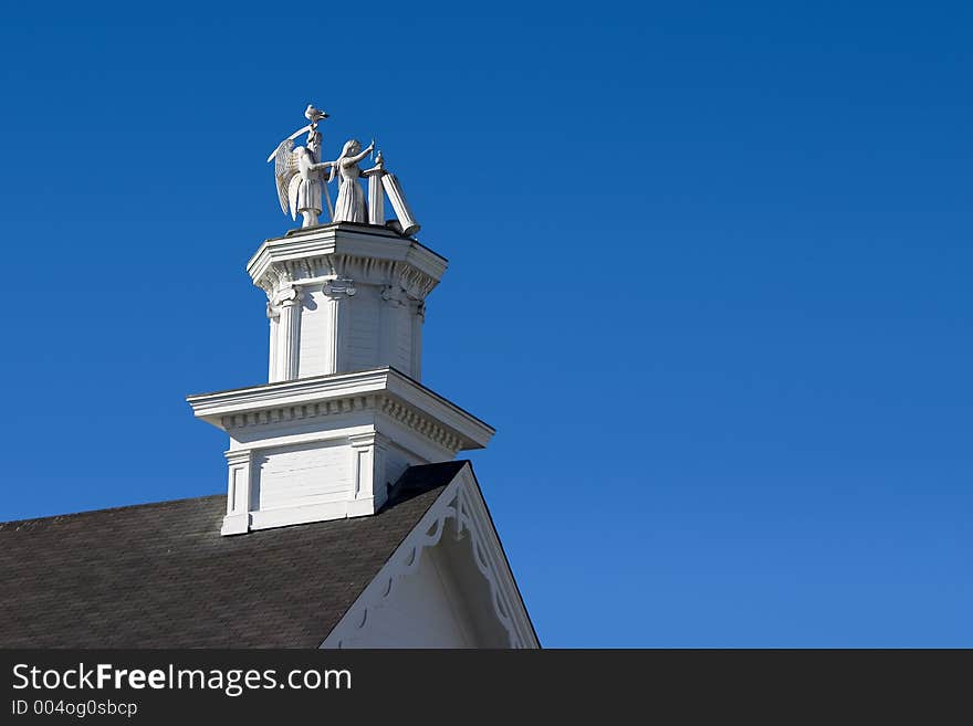 A statue depicting death on an old building in Mendocino California. A statue depicting death on an old building in Mendocino California.