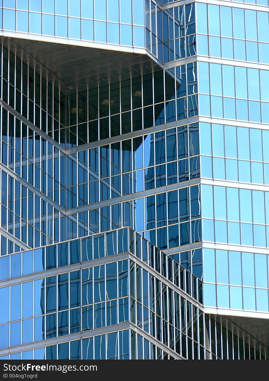 Angles and squares of glass in this skyscraper. Angles and squares of glass in this skyscraper.