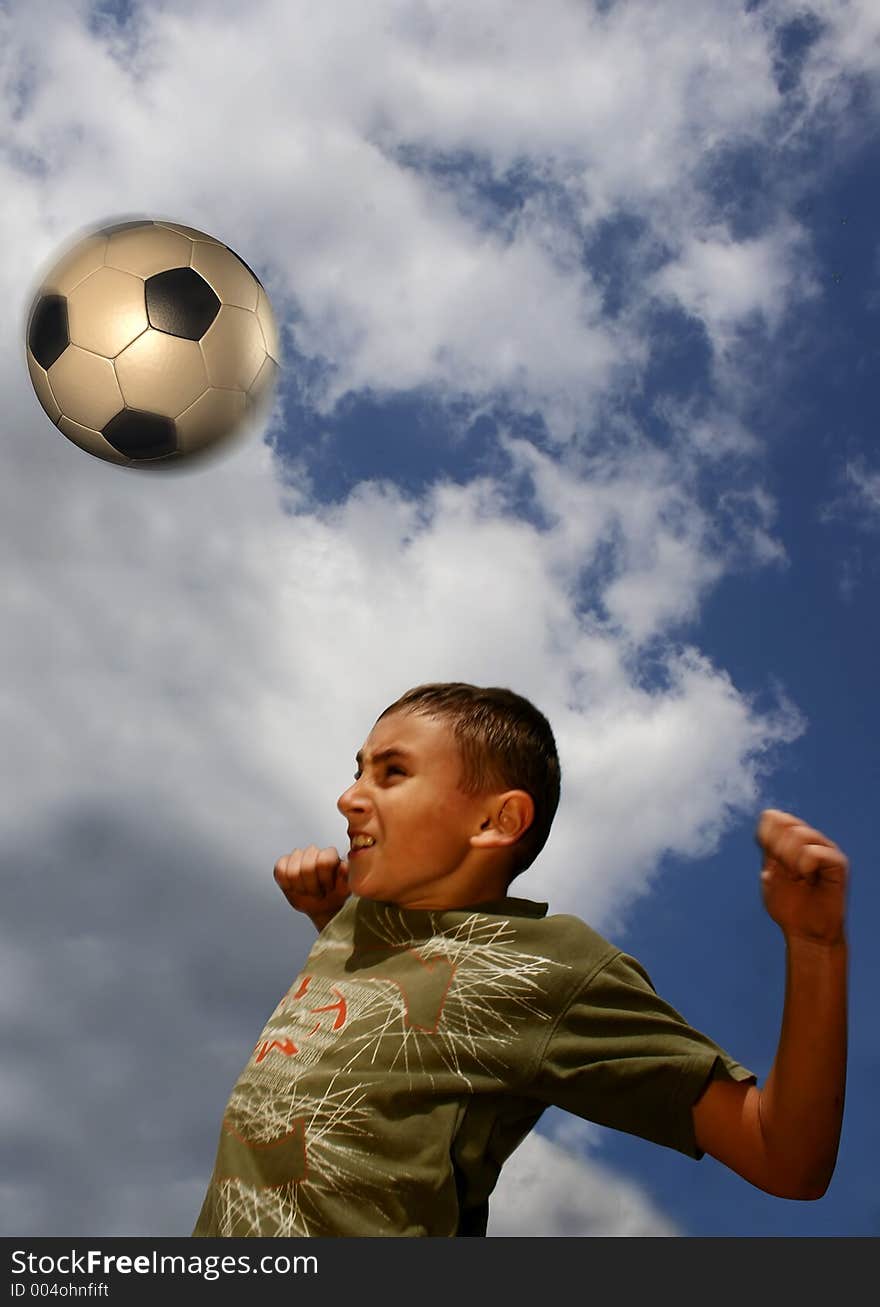 Young boy playing football. Young boy playing football