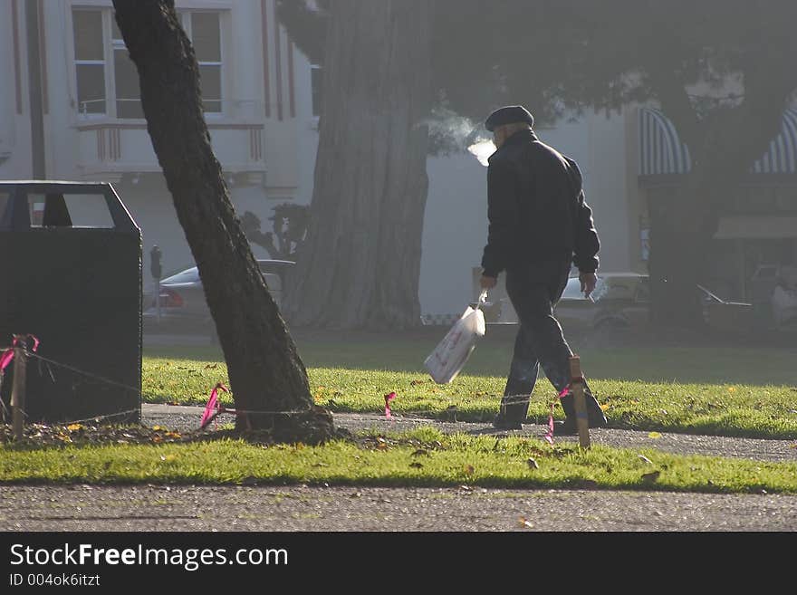 A morning walker gets his daily dose of exercise and carcinogens. A morning walker gets his daily dose of exercise and carcinogens.