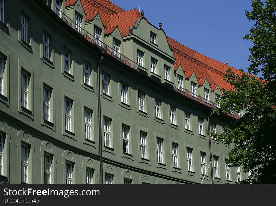 Curved building with rows of windows in Munich, Germany. Curved building with rows of windows in Munich, Germany.