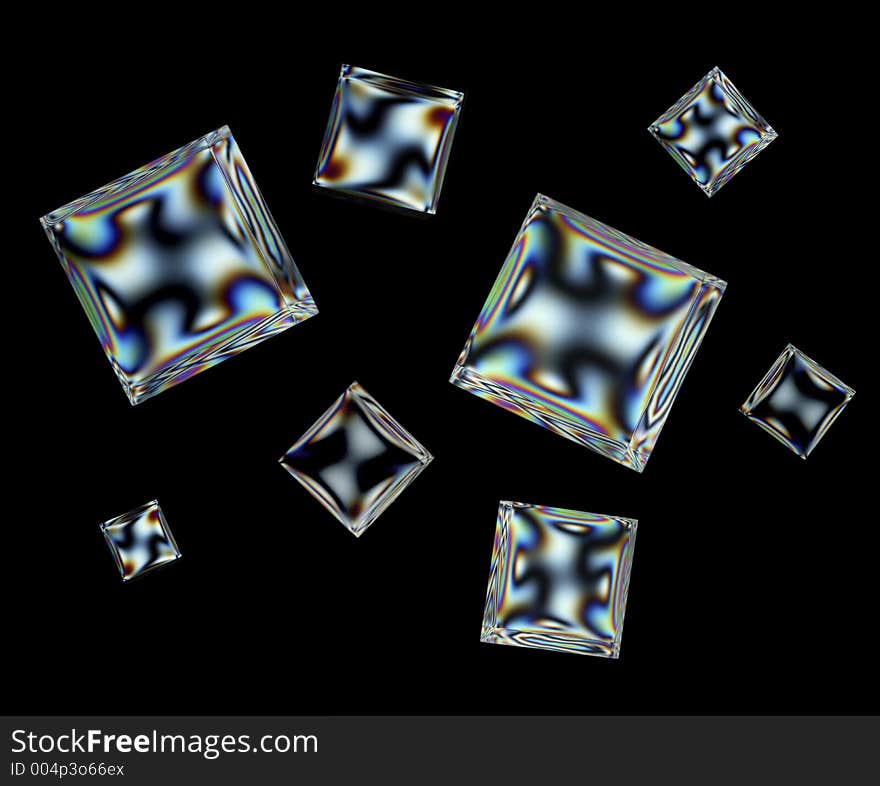 Acrylic cubes exposed through crossed polarized filters to reveal stress patterns. Acrylic cubes exposed through crossed polarized filters to reveal stress patterns.