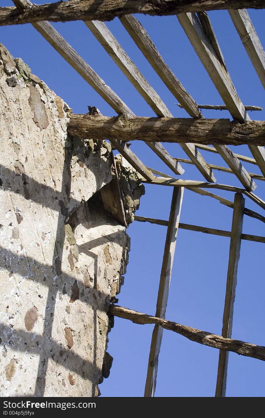 Ancient farm building stripped of all its welsh slate tiles. Ancient farm building stripped of all its welsh slate tiles.