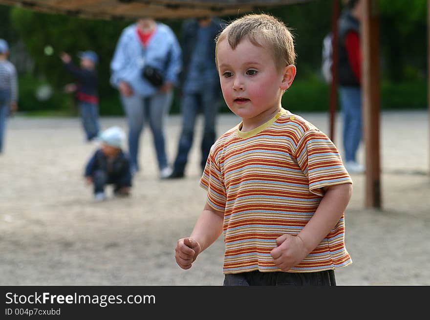 Healthy kid running full of energy in the park