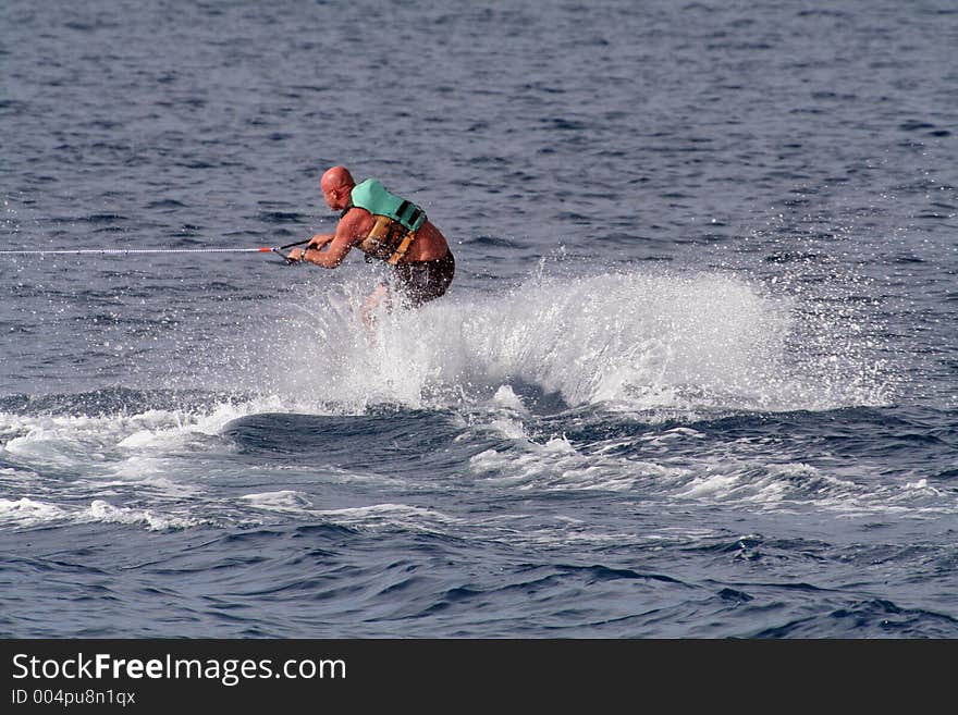 Beginner wakeboarder alone, with no boat showing