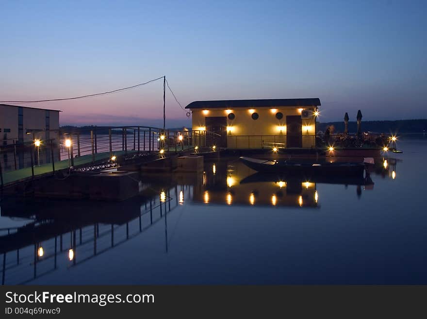 Yellow raft on Danube river in twilight. Yellow raft on Danube river in twilight