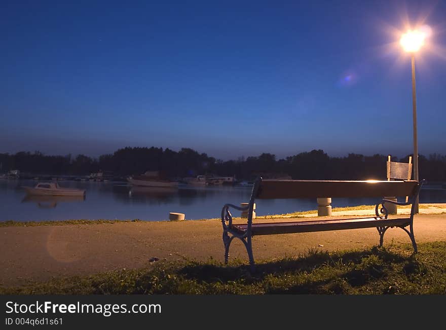 Desk on the riverside in the twilight. Desk on the riverside in the twilight