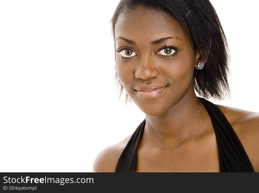 A beautiful young woman staring at the camera. A beautiful young woman staring at the camera