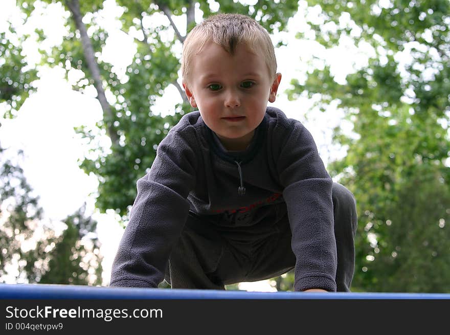 Spider kid preparing for jump