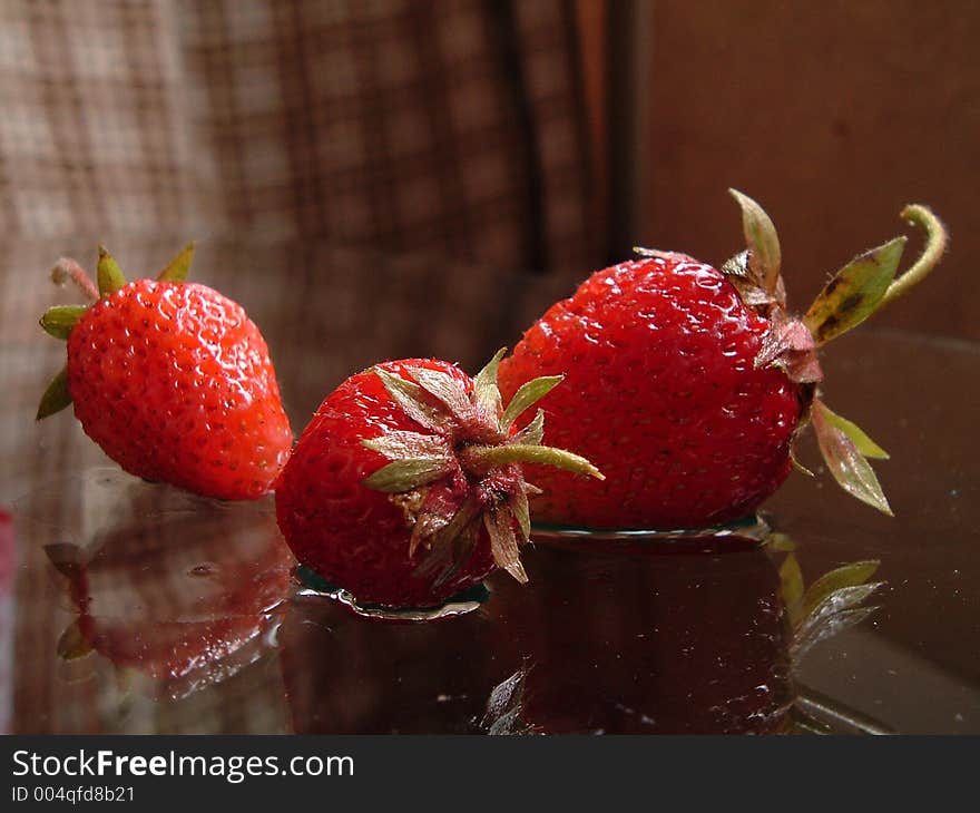 Three strawberrieses. Three strawberrieses