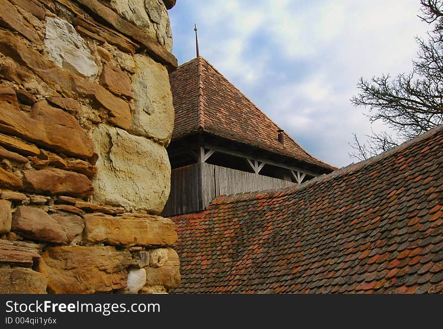 View from the inner courtyard in the old fortified citadel of Viscri. Built by peasants, these citadels are famous for the South Eastern area of Transylvania, built by German colonists in the middle ages. Now part of the Unesco Heritage. View from the inner courtyard in the old fortified citadel of Viscri. Built by peasants, these citadels are famous for the South Eastern area of Transylvania, built by German colonists in the middle ages. Now part of the Unesco Heritage.