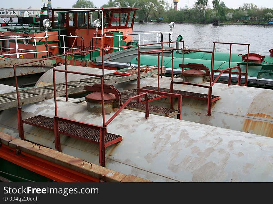 Barge moored near riverside