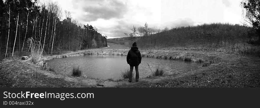 Woman Overlooking a Pond (Panorama)