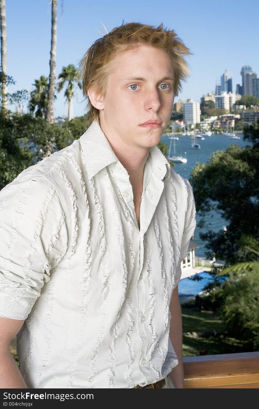 Young man on the balcony