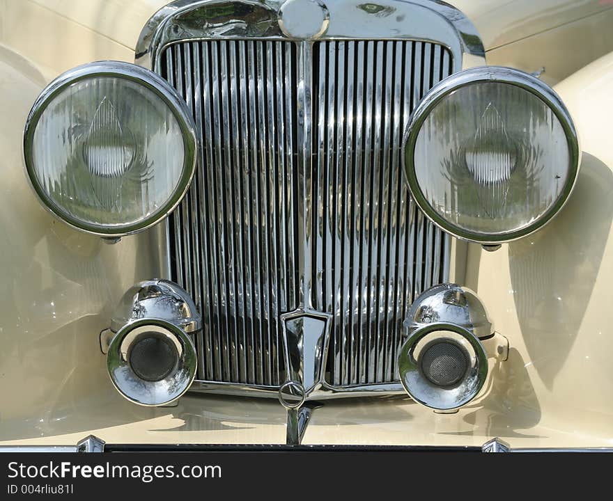 Font grill and head lights of a vintage car