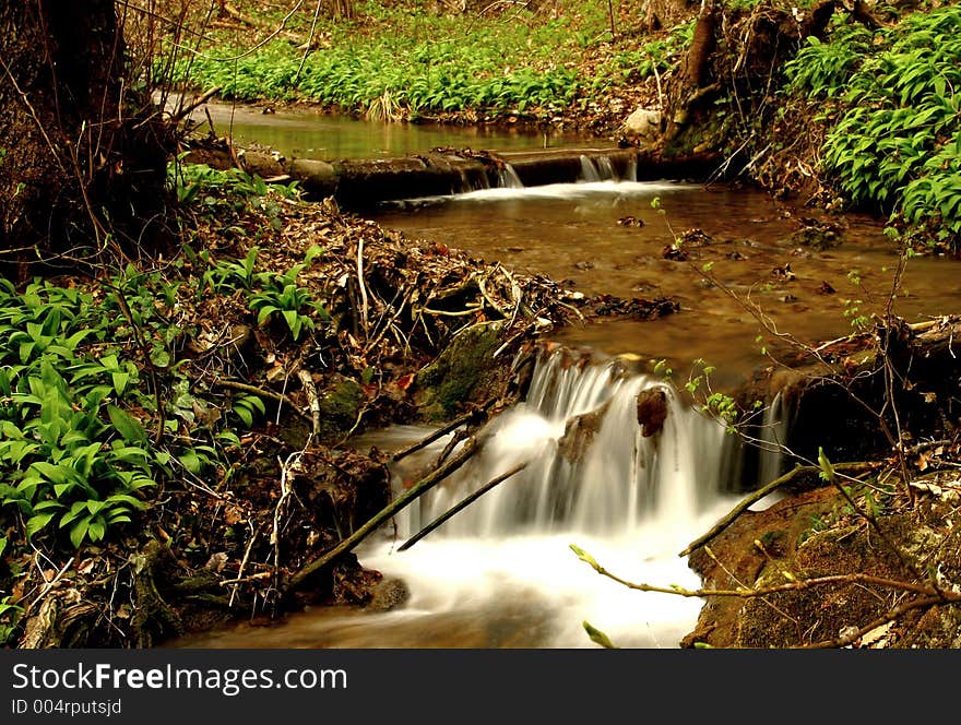 Waterfalls on small creek in spring in Austria. Waterfalls on small creek in spring in Austria