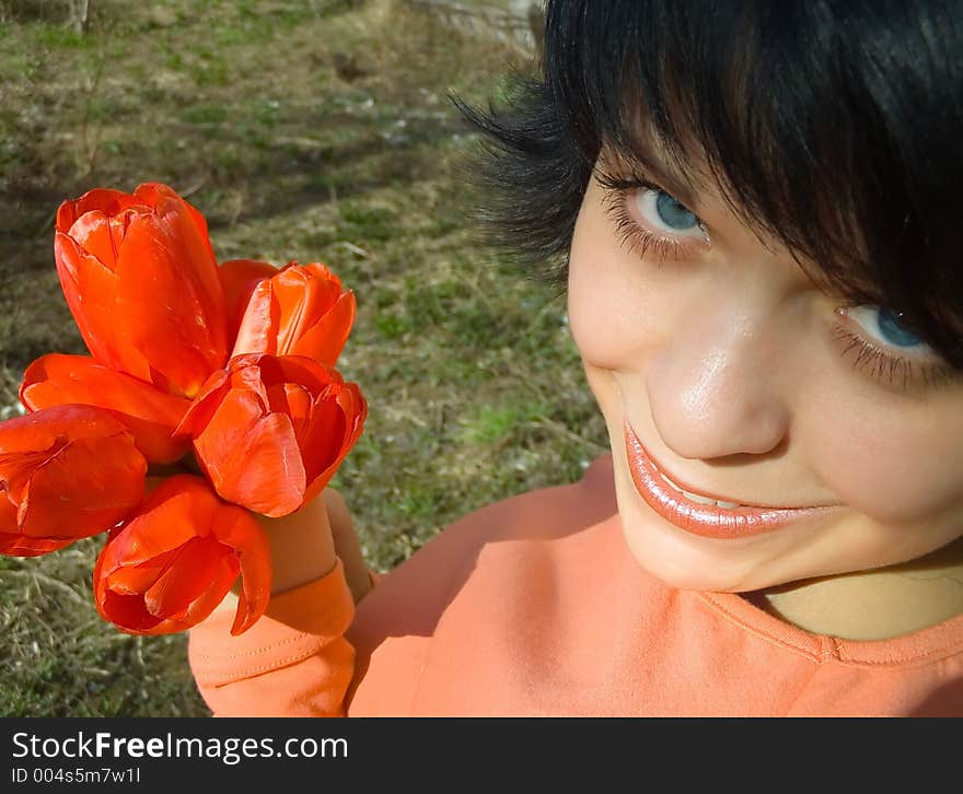 The girl and flowers. The girl and flowers