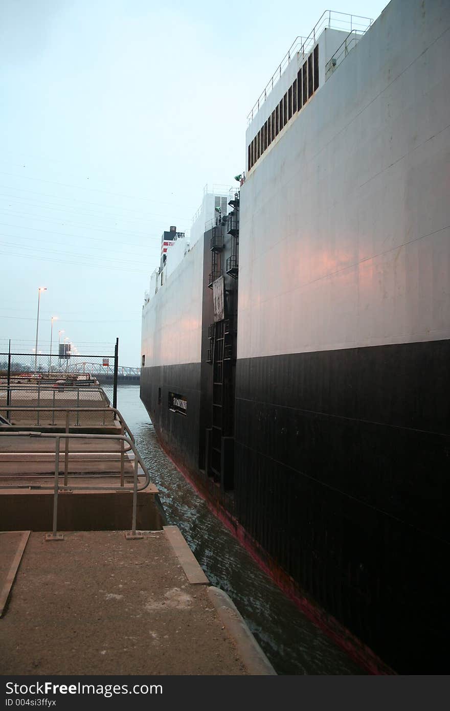 Large boat passing by in a dock. Large boat passing by in a dock