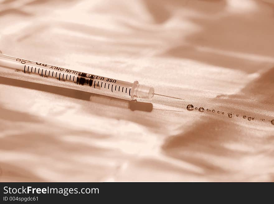 Sepia duotone insulin needle. Sepia duotone insulin needle