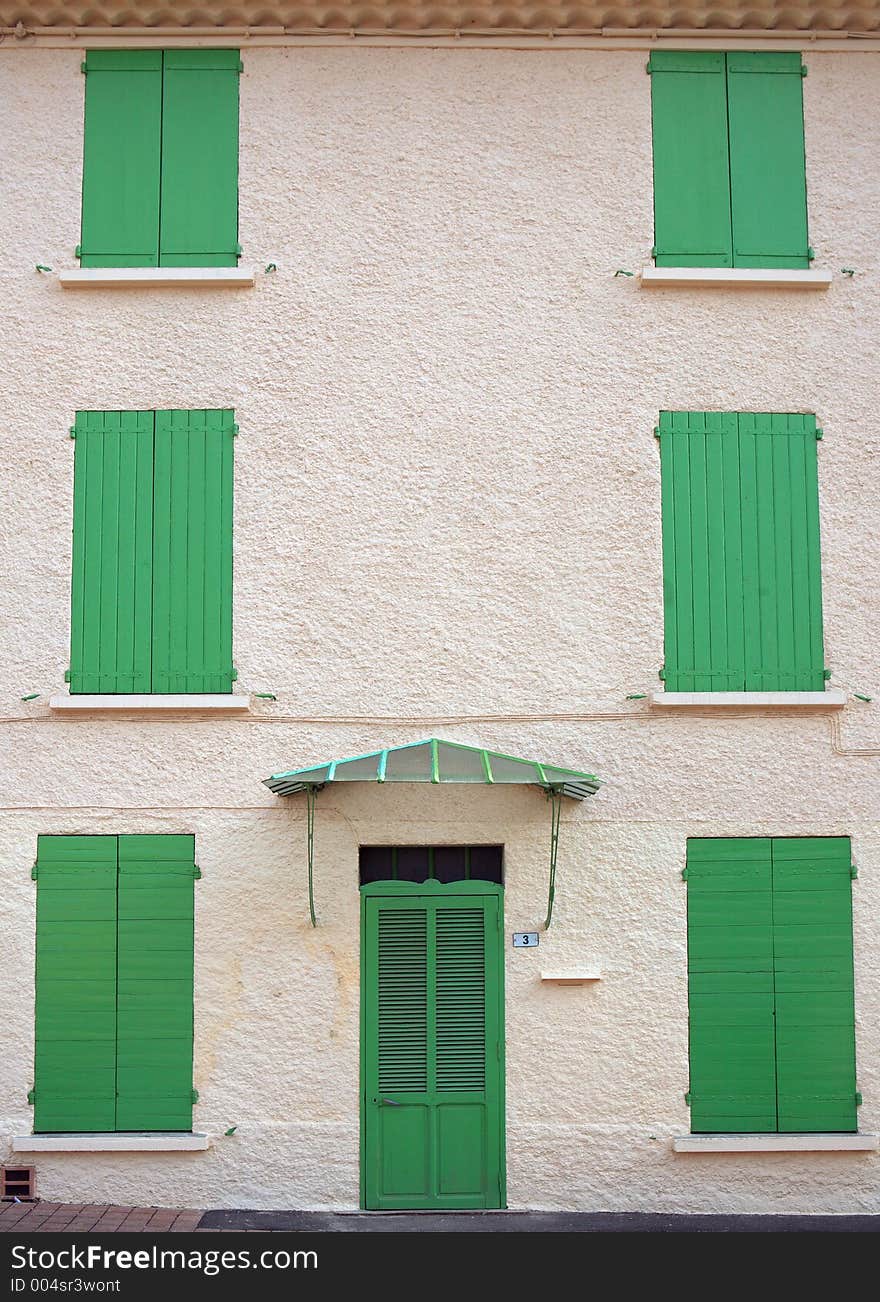 French house with green blinds