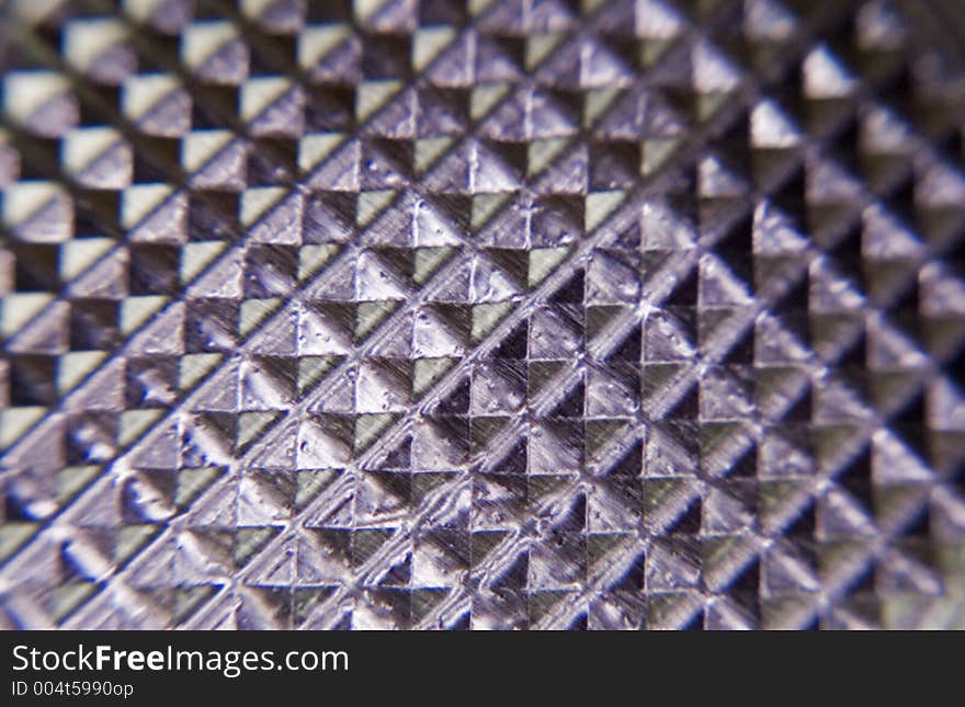 Macro of embossed metal foil. Macro of embossed metal foil