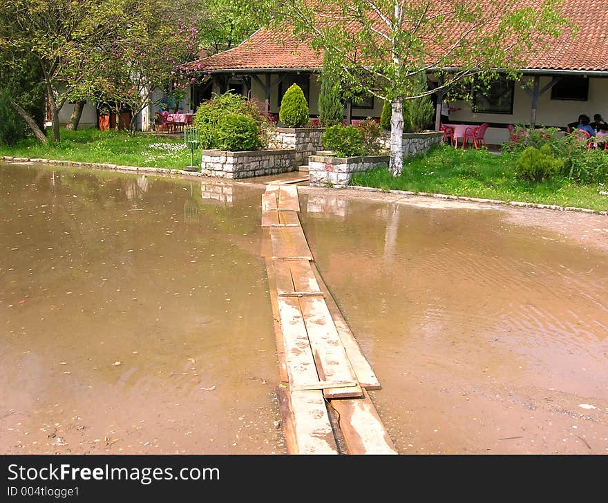 Improvised brigde over the big pool, way to the restaurant, flood. Improvised brigde over the big pool, way to the restaurant, flood