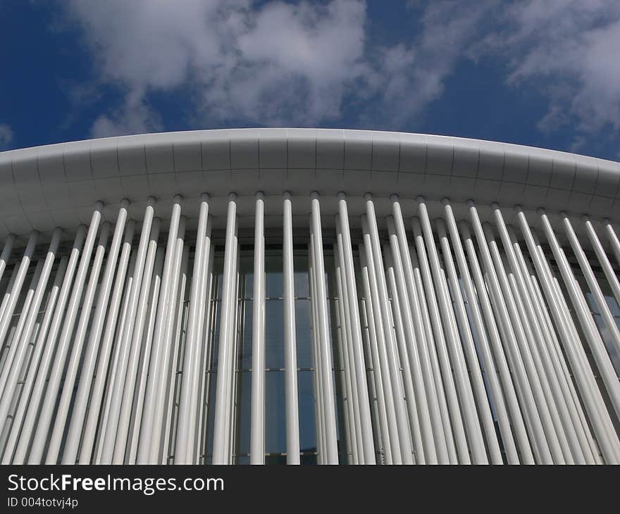 White Concert hall luxembourg with blue sky behind