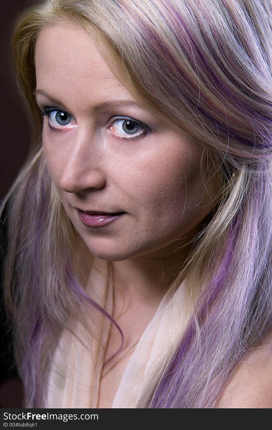 Portrait of attractive young woman with violet hair. Portrait of attractive young woman with violet hair