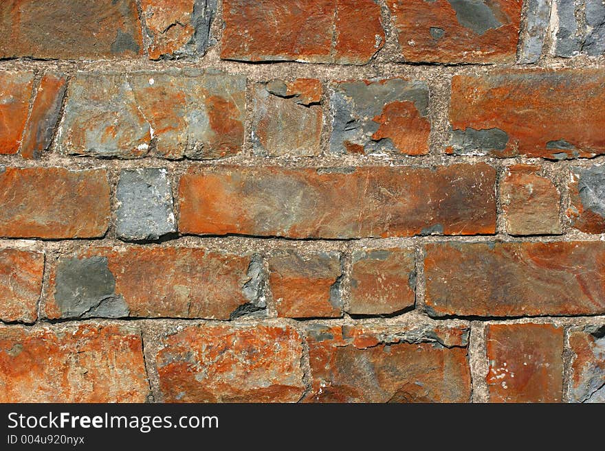 Old handcrafted sand stone wall.