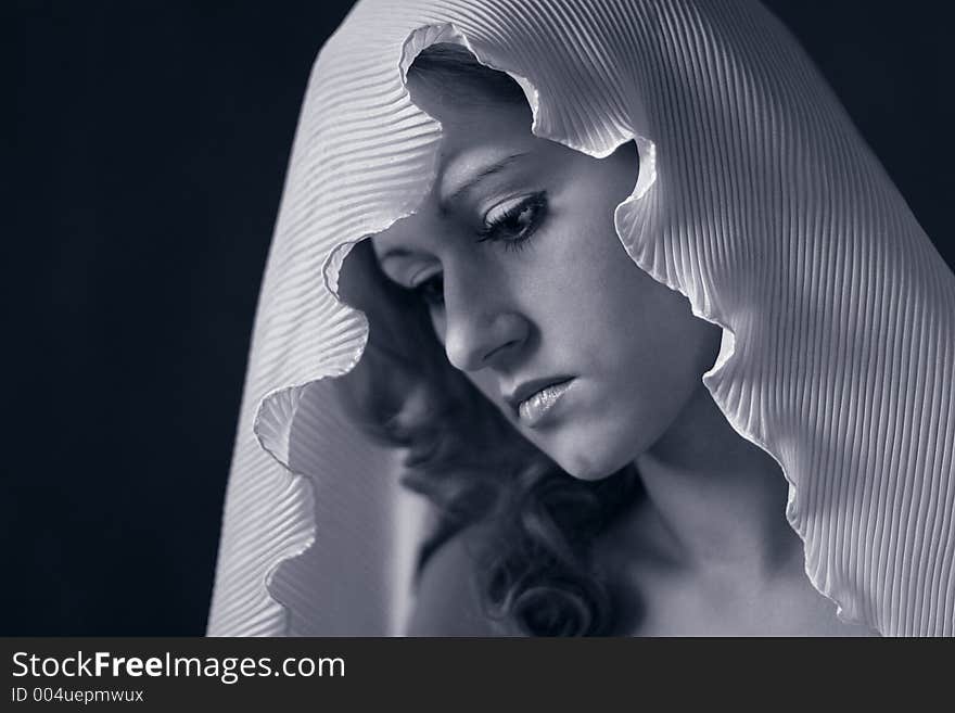 Portrait of the beautiful girl with a scarf on a head. Portrait of the beautiful girl with a scarf on a head.