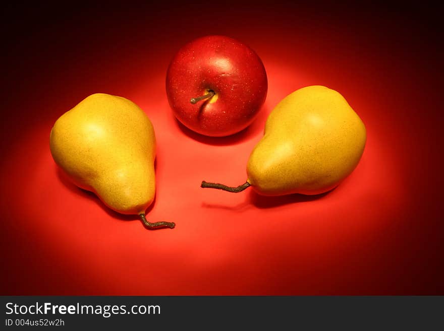 Three Pieces of Artificial Fruit are Displayed.