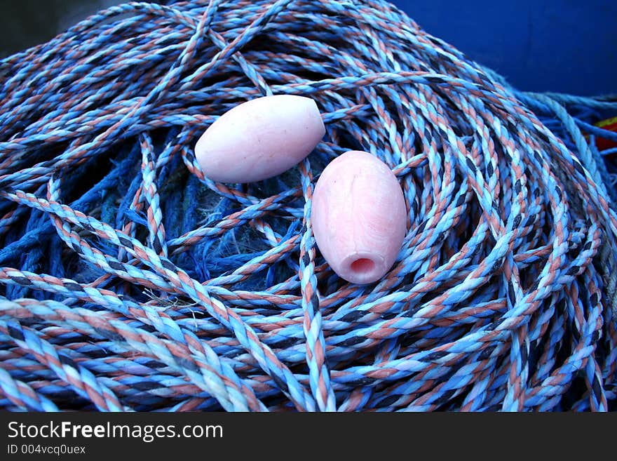 Close Up Of Floats And Fishing Rope.