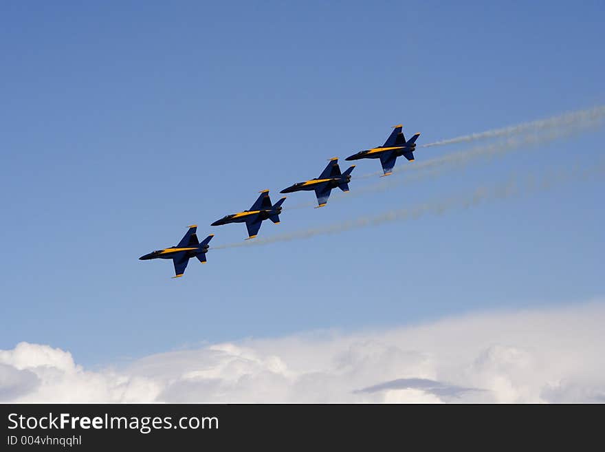 The Blue Angels fly in formation at an airshow