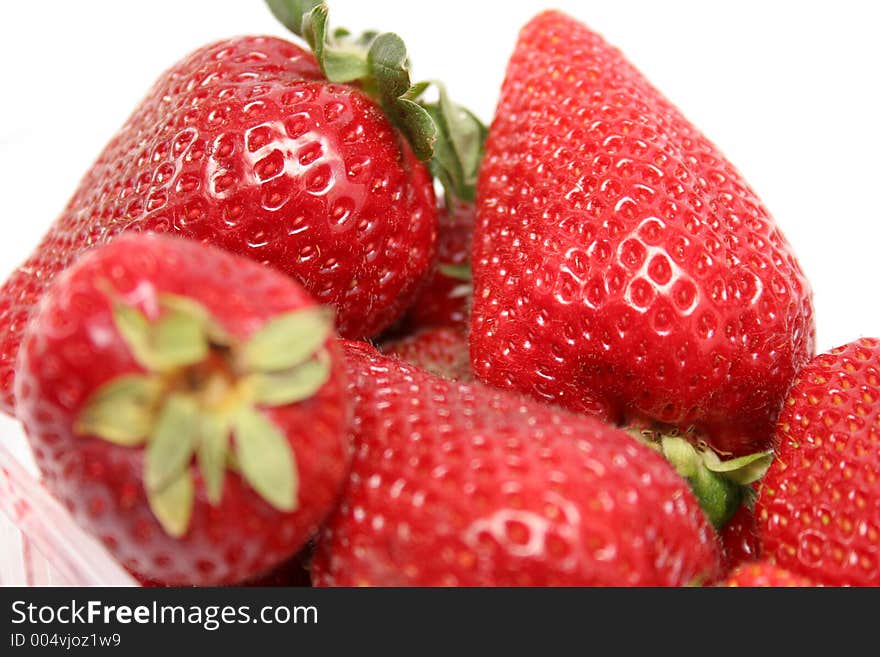 Several strawberries in isolated