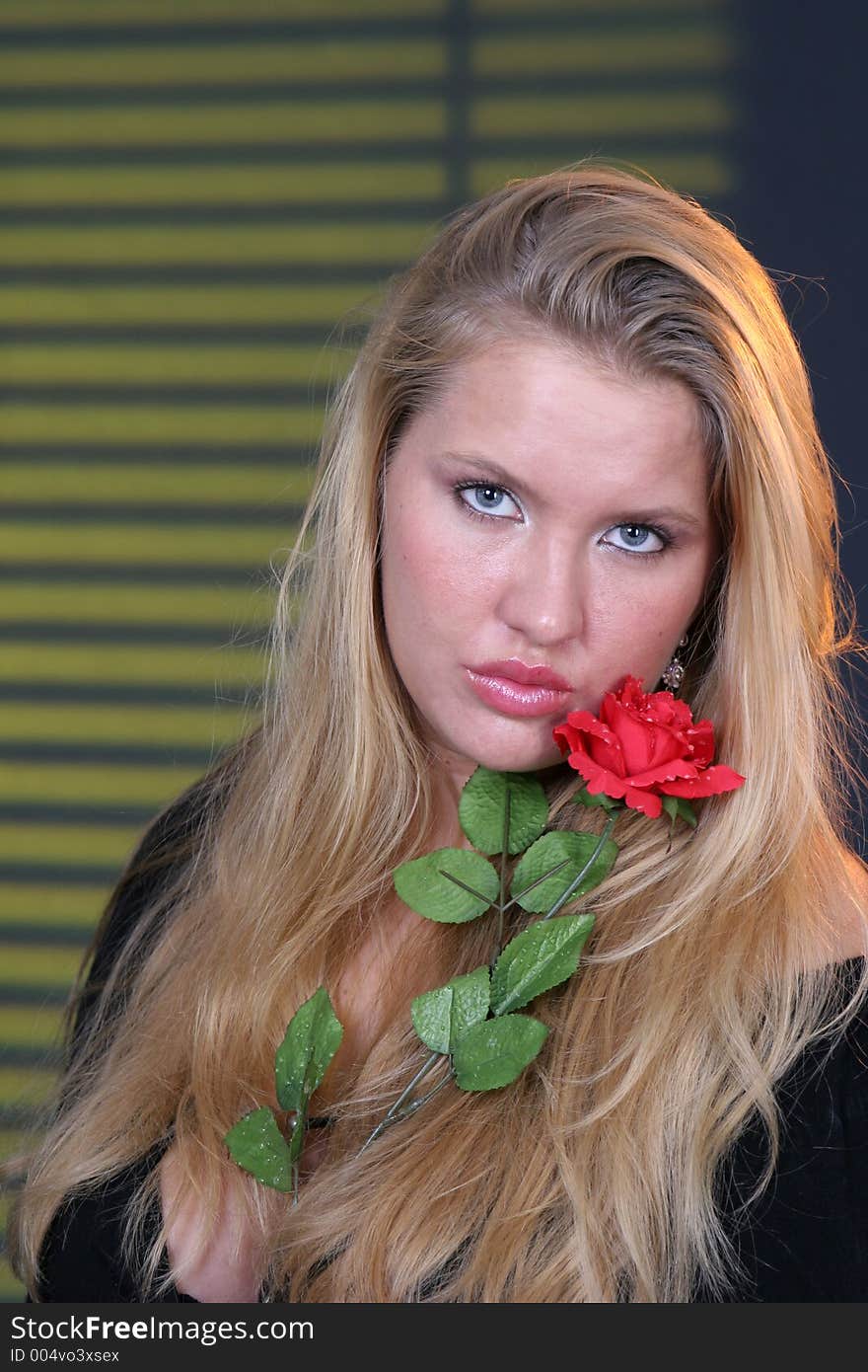 Blonde girl with red rose. Blonde girl with red rose