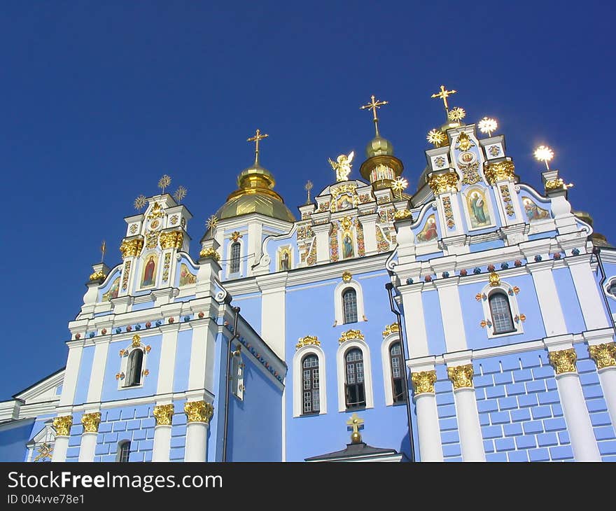 Gold domes of ortodox cathedral shine with sun. Gold domes of ortodox cathedral shine with sun