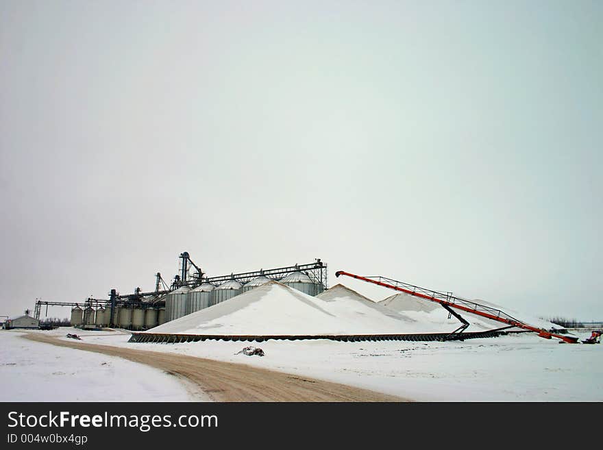 Large inland terminal with piles of barley outside. Large inland terminal with piles of barley outside