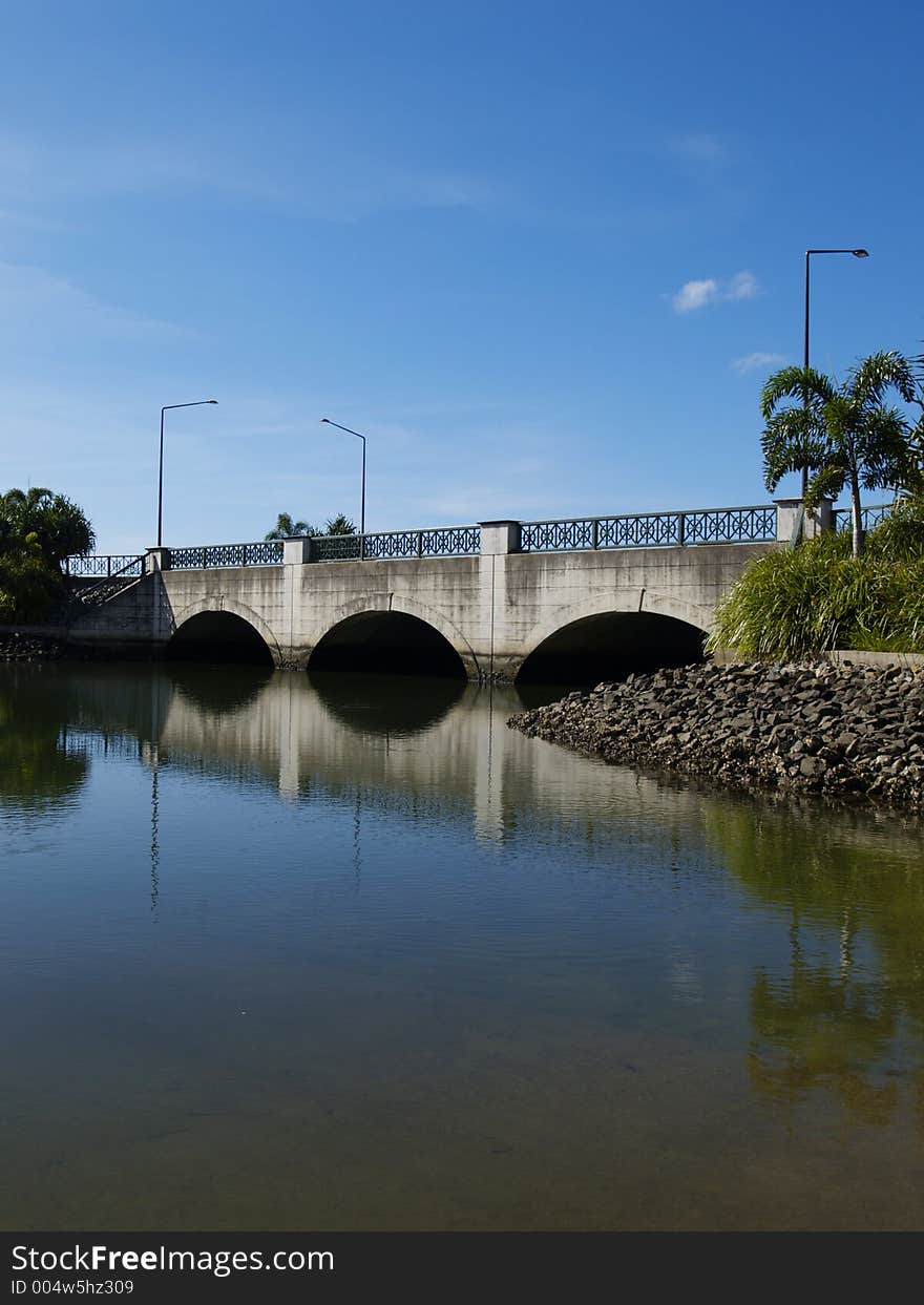 A road bridge over a river. A road bridge over a river