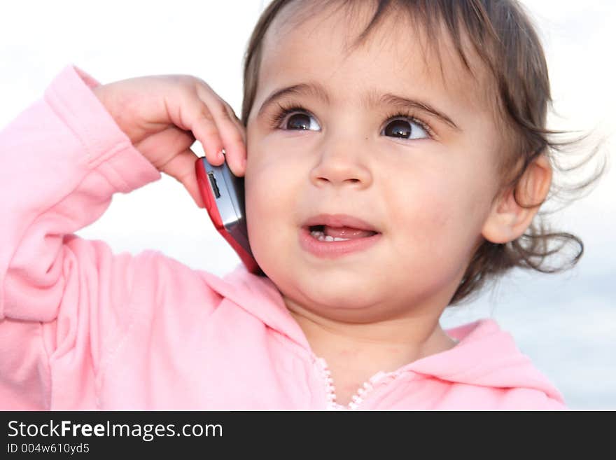 Child talking on mobile phone. Child talking on mobile phone